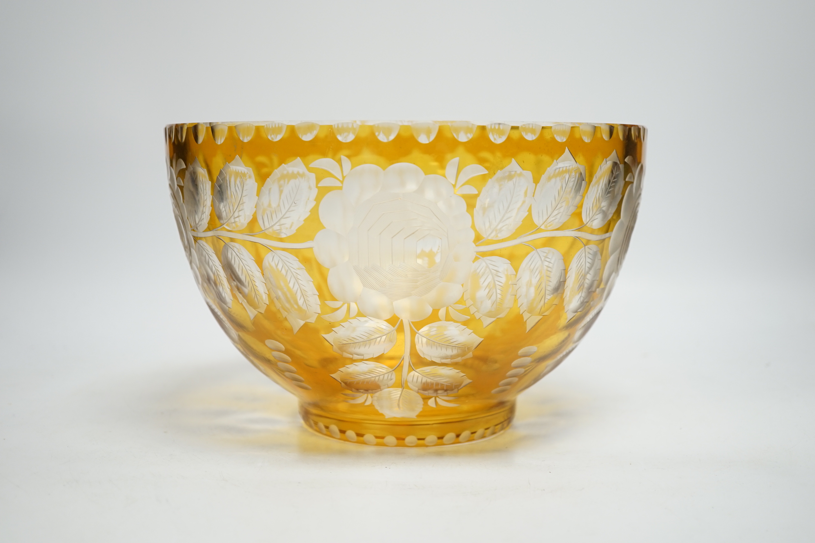 A Bohemian yellow overlaid glass bowl, 24cm diameter